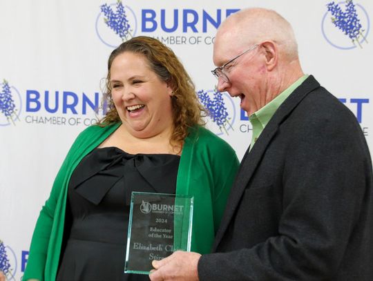 Burnet CISD Superintendent Aaron Pena highlighted the achievements of Elizabeth Claire Stires, the 2025 Burnet CISD Educator of the Year, when receiving her award from Mark Kincaid. Find more photos on Page 14.