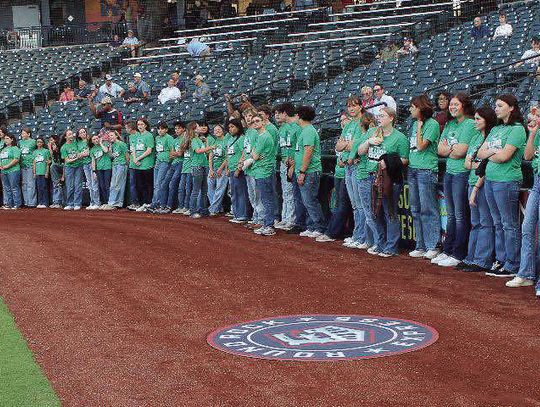 Choir strikes the right chord at Dell Diamond