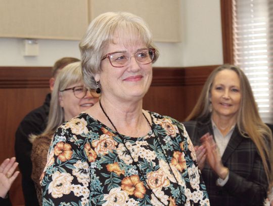 Pct. 4 Justice of the Peace Debbie Bindseil acknowledges applause and praise Jan. 14 during the County Commissioners meeting. Behind Bindseil is, from left, former Burnet County judge and treasurer Donna Klaeger, Pct.1 Justice of the Peace Roxanne Nelson and Pct. 3 Justice of the Peace Jan...