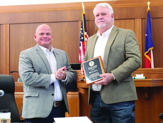 Raymond V. Whelan/The Bulletin On Dec. 19, Pct. 3 Commissioner Damon Beierle presented Pct. 2 Commissioner Billy Wall with a plaque thanking him for his service as a commissioner.