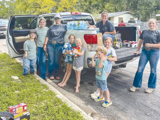FFA members roll up sleeves for flood cleanup