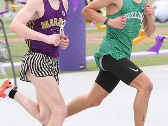 Bulldog senior athlete, Victor Aviles, earned three gold medals in the Bulldogs first track outing of the season. Aviles won the 3200, pictured above, as well as the 800 and 1600 meter runs earning 30 team points. Photo by Wayne Craig/ Clear Memories