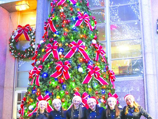 Burnet High School Highlandettes posed for a photo after their performance Nov. 30 at the Lighting of the Square. Find more photos on Page 12. Martelle Luedecke/Luedecke Photography