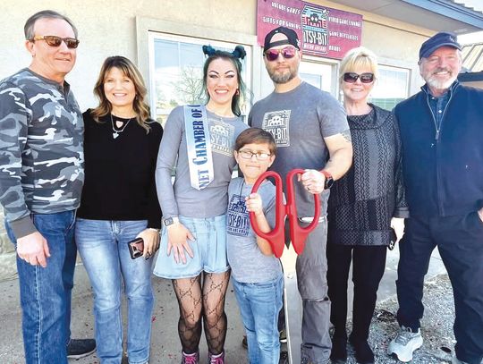 Contributed photo The Itsy-Bit arcade had its ribbon-cutting in Burnet on Jan. 17. Pictured, from left, are: David Bolen, Cassy Bolen, co-owner Miranda (Mandy) Lowry, Joel Lowry, co-owner Blake Lowry, Sharon Lowry, Michael Lowry.
