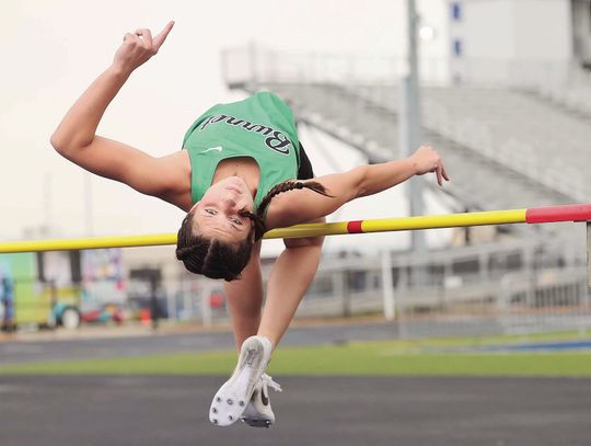 JV Lady Dawg high jumper Brooklynn Dawes clears 4’10 to win a district championship at Wednesday’s 24-4A Meet in Jarrell. Photos by Wayne Craig/Clear Memories