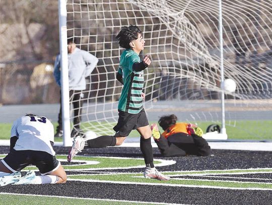 Miguel Valdez celebrates one of his record setting single game six goals. Valdez and his teammates won 12-2 over Florence in district play. Photos by Wayne Craig/Clear Memories