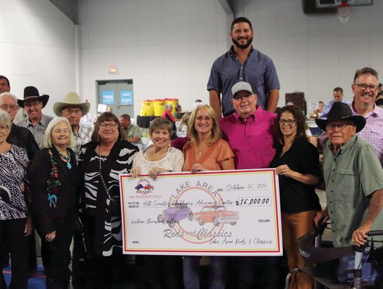 Rifles, Racks, and Deer Tracks presenting sponsor, Lake Area Rods &amp; Classics Car Club, presented Hill Country Children’s Advocacy Center with a check Oct. 26 at the Highland Lakes YMCA. Photos by Martelle Luedecke/Luedecke Photography