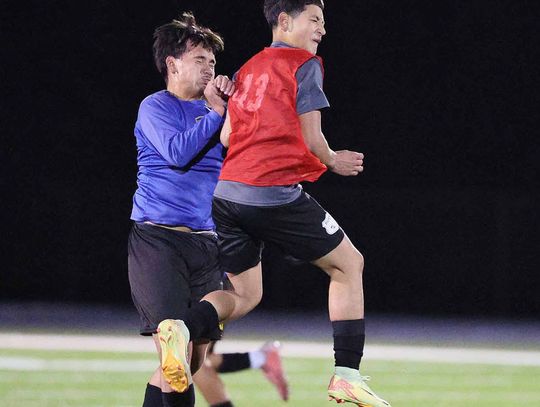 Photos by Wayne Craig/Clear Memories Competing at a high level: Burnet soccer player, Jose Flores goes skyward as he battles for the ball versus Pflugerville in a recent scrimmage.