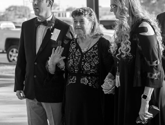 Contributed photos/ Hill Country Fellowship Travis Dieter and Karen Kelley were escorted by DeAnn Fraser to the Night to Remember event at Hill Country Fellowship April 4.