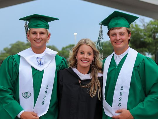Trey Morrow, Mikal-Ann Milam and Drake Milam shared a joyful smile for the camera just moments before the graduation ceremonies began. Martelle Luedecke/Luedecke Photography