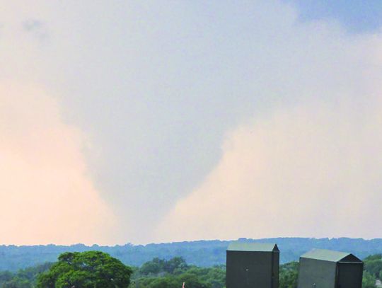 A funnel cloud loomed over an area in Burnet County between Briggs and Liberty Hill May 1, bringing rain and wind damage. Contributed photo
