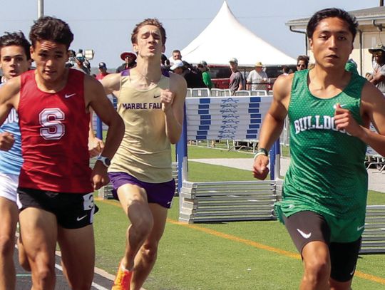 Above, Burnet senior Victor Aviles shows no signs of distress as he cruises through the finish line of the 800 meters.