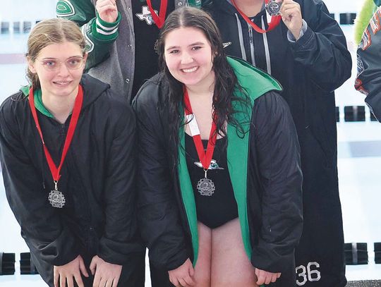 The Lady Dawg 400 free relay team of (back row) Caroline Lunsford and Graciela Lara Duran, and (front row) Madison Lawry and Sophia Cardenas placed second at district earning a regional berth. Photos by Wayne Craig/Clear Memories