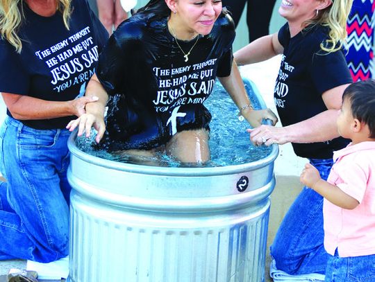 Martelle Luedecke/Luedecke Photography After Dawn Adkins and Aaris Farmer baptized Young Lives Jillian Chavira, she rose from the water to the loving face of her son March 24 at Hill Country Fellowship Church.