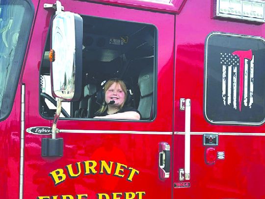 The generosity of Jocelyn Cullen was lauded by the Burnet Fire Department, where she was honored with the fire chief’s Challenge Coin. Contributed photo