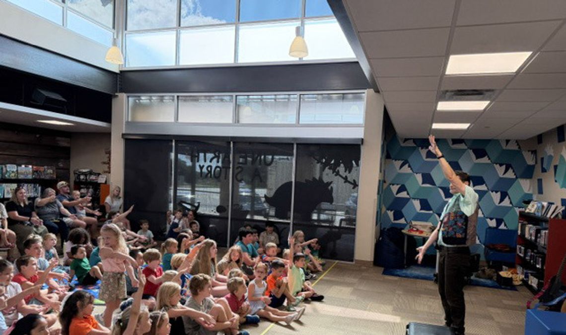 Bertram library visitor delights children Bertram library visitor delights children