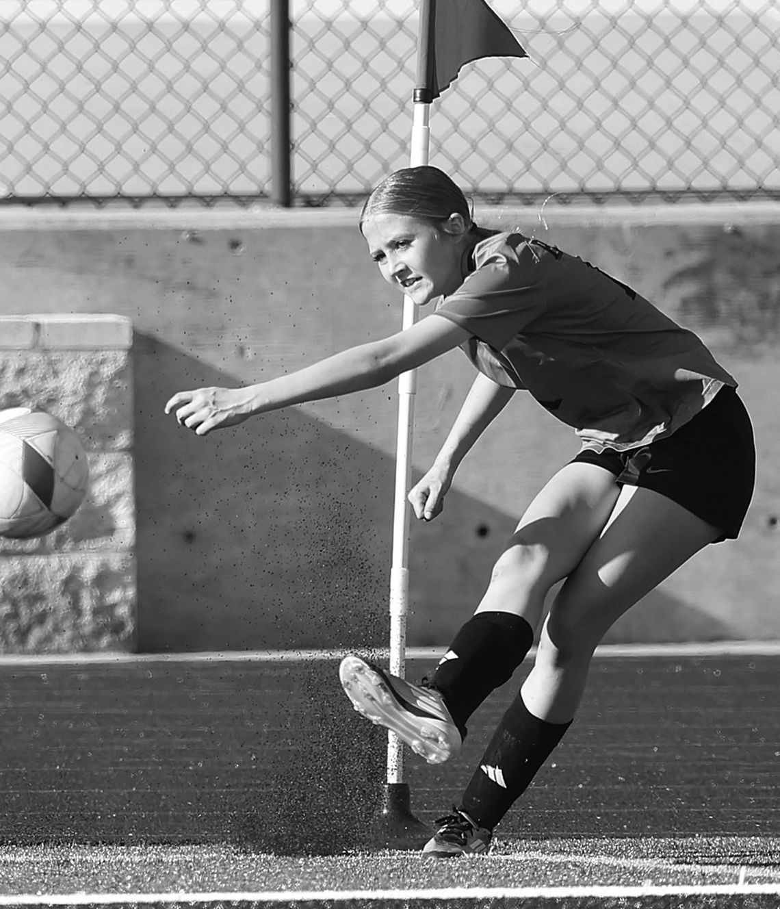 JV Lady Bulldog, Lillian Barnard sends a corner kick to a teammate during district play on Tuesday. Burnet’s JV defeated Lago Vista 5-1 and earned an undefeated district championships last week.