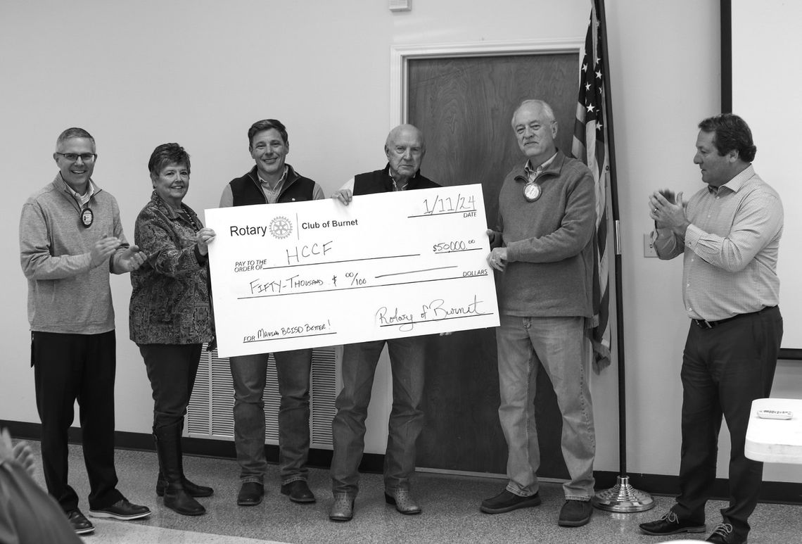 Photo by Martelle Luedecke/ Luedecke Photography Keith McBurnett, Earline Zimmerman, David Bennett, Cary Johnson, and Dennis Hoover accepted a $50,000 check from Matt McCracken, representing the Rotary Club of Burnet, for the Hill Country Community Foundation during a donation event at the...