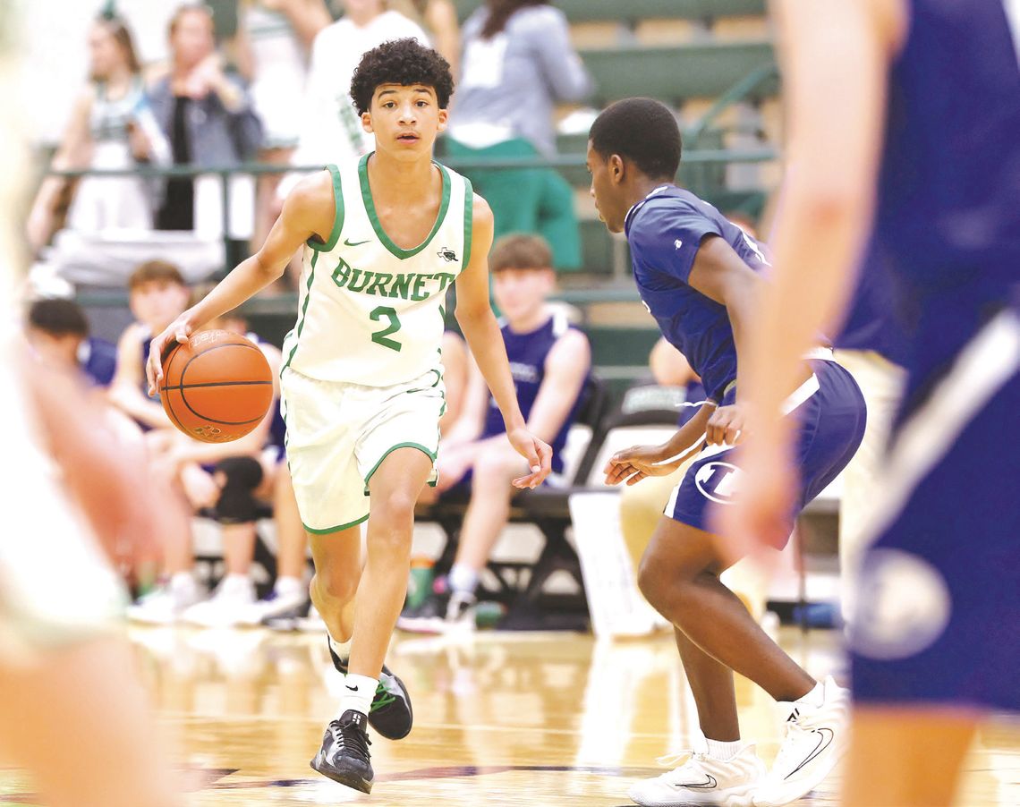 JV Bulldog basketball player, Cam Edwards, brings the ball down for Burnet during their Tuesday night home game versus Lampasas. Photo by Wayne Craig/Clear Memories