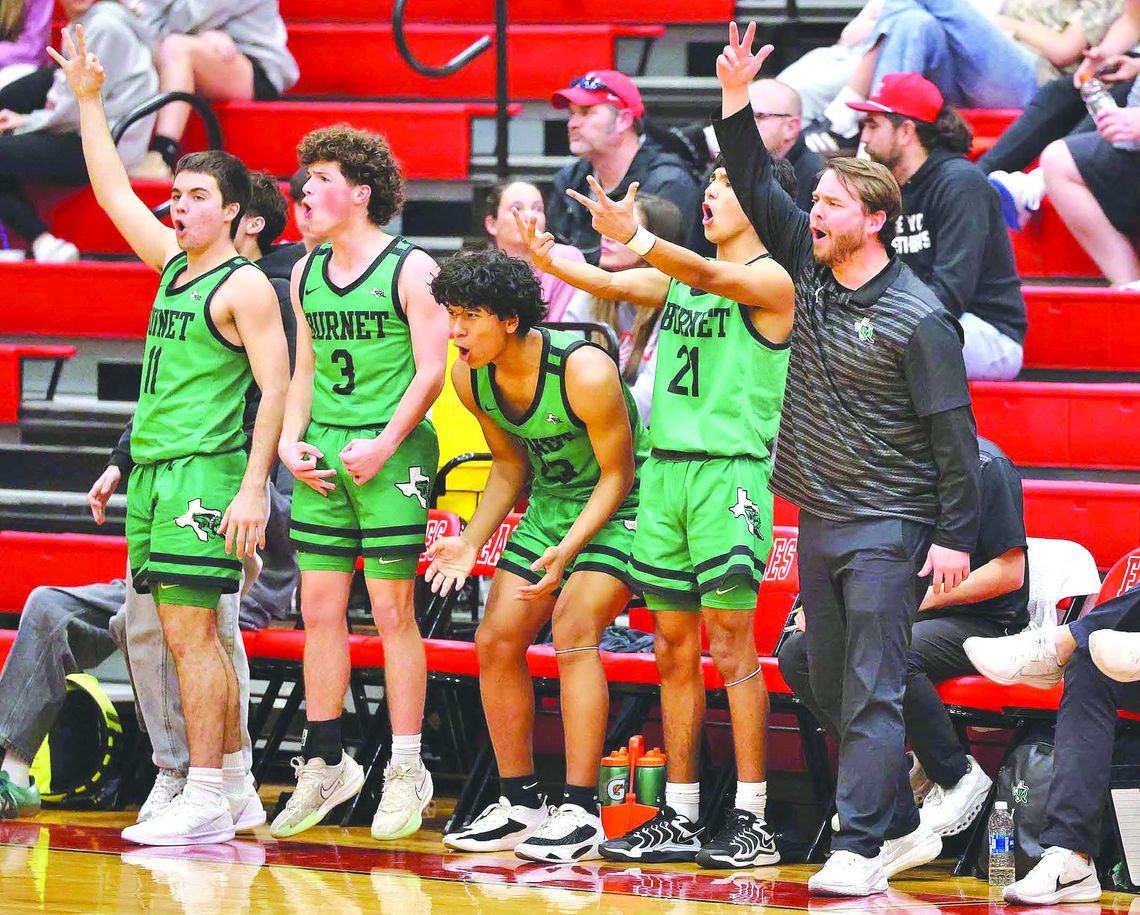 Photos by Wayne Craig/ Clear Memories The Bulldog bench goes wild as teammate Benito Bocanegra hits one of his five three pointers. Bocanegra and his Bulldog teammates collected a big win at Salado.