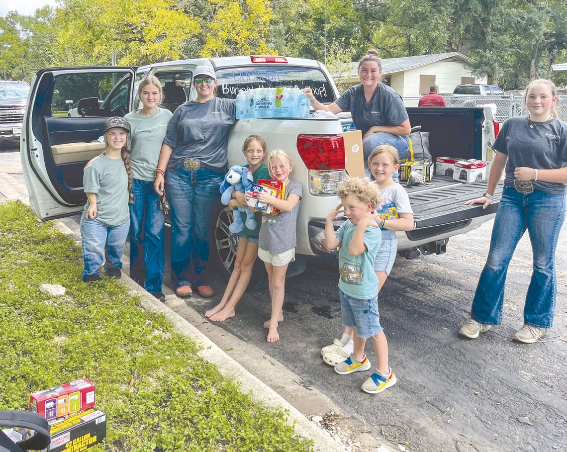 FFA members roll up sleeves for flood cleanup