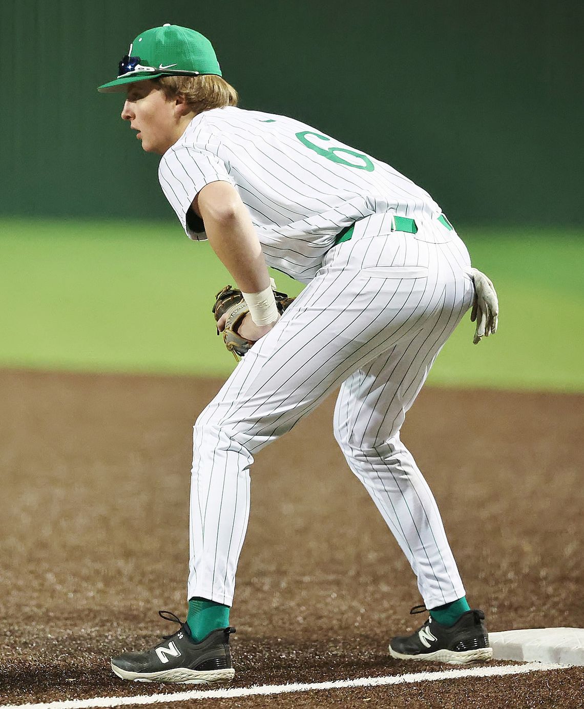 With a runner on varsity first baseman, Drake Milam stays alert during a recent game. The Dawgs have enjoyed a successful start to their 2025 season. Photo by Wayne Craig/Clear Memories