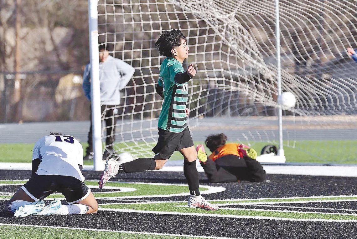 Miguel Valdez celebrates one of his record setting single game six goals. Valdez and his teammates won 12-2 over Florence in district play. Photos by Wayne Craig/Clear Memories