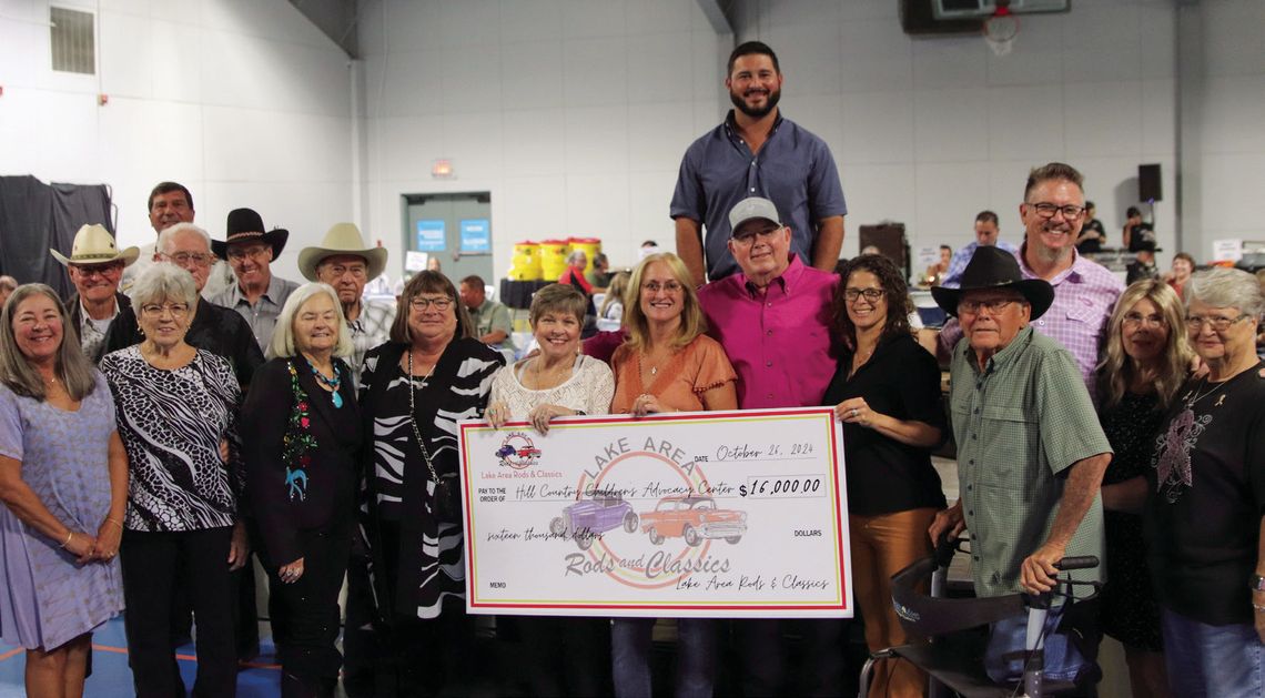 Rifles, Racks Rifles, Racks, and Deer Tracks presenting sponsor, Lake Area Rods & Classics Car Club, presented Hill Country Children’s Advocacy Center with a check Oct. 26 at the Highland Lakes YMCA. Photos by Martelle Luedecke/Luedecke Photography