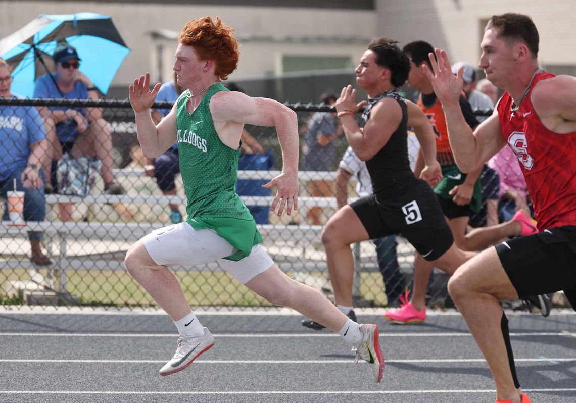 Varsity Bulldog, Braxton Ringstaff, sprints past some competitors in the boys’ 100 meter dash. Ringstaff took fourth place overall earning four points for his team.