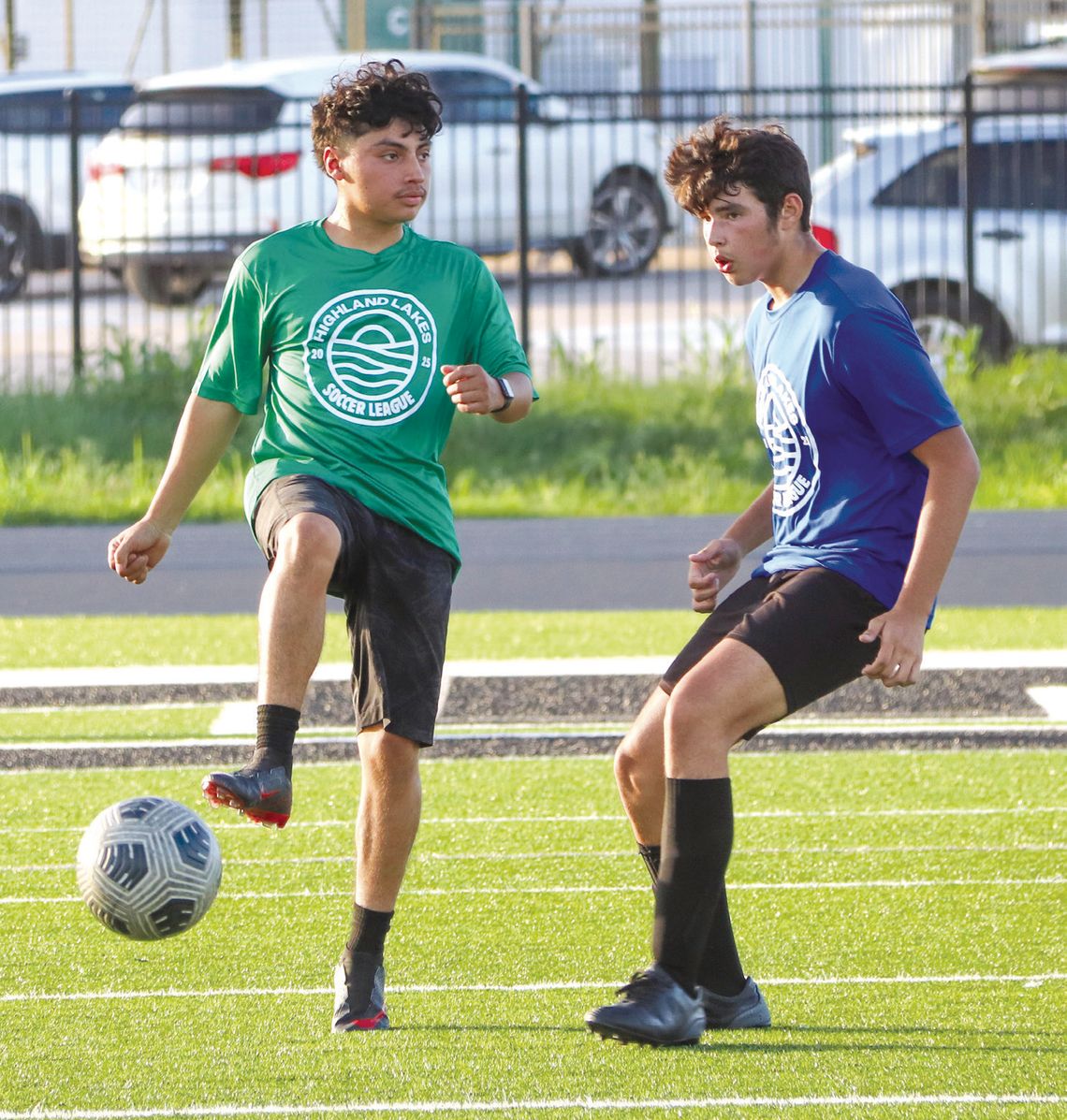 Soccer team uses summer to help themselves, neighbors