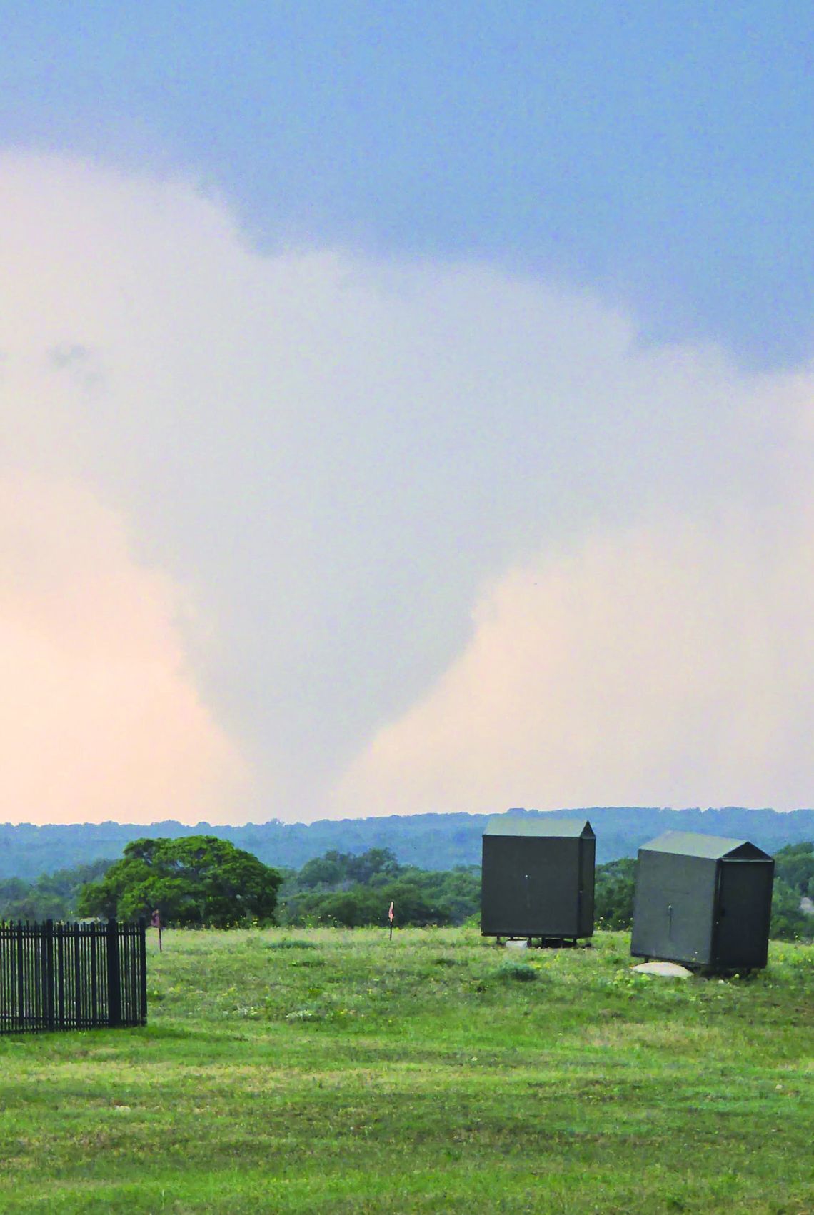 A funnel cloud loomed over an area in Burnet County between Briggs and Liberty Hill May 1, bringing rain and wind damage. Contributed photo