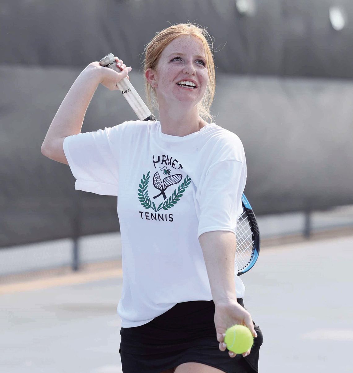 Lady Bulldog tennis athlete, Alex Burns, offers up service with a smile during a recent match. Burnet tennis will host CameronYoe on Thursday for their third district match. Photos by Wayne Craig/Clear Memories