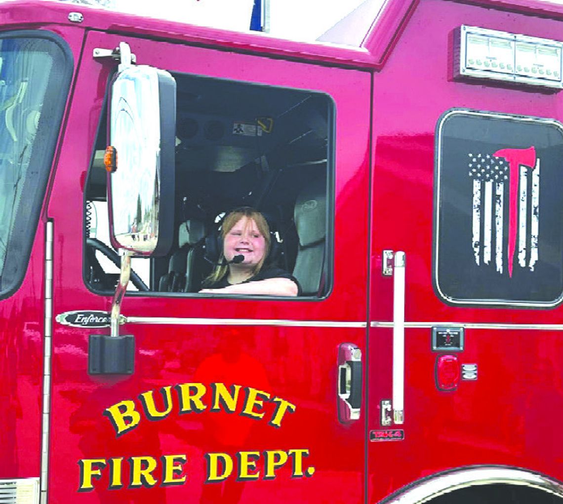 The generosity of Jocelyn Cullen was lauded by the Burnet Fire Department, where she was honored with the fire chief’s Challenge Coin. Contributed photo